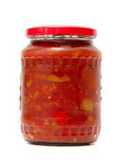 tomato paste in a jar on a white background