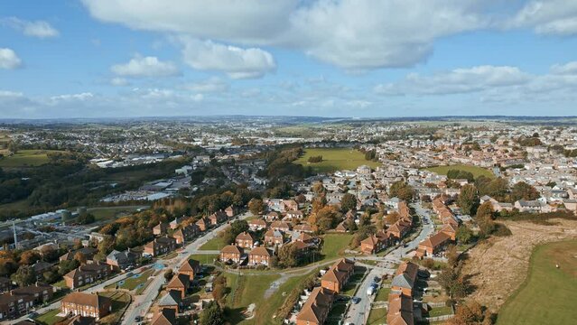 Aerial View of a typical UK town, suburb district sowing housing, gardens and roads. West Yorkshire UK