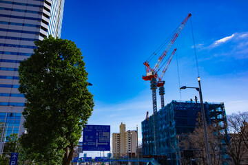 Fototapeta premium Cranes at the under construction in Tokyo