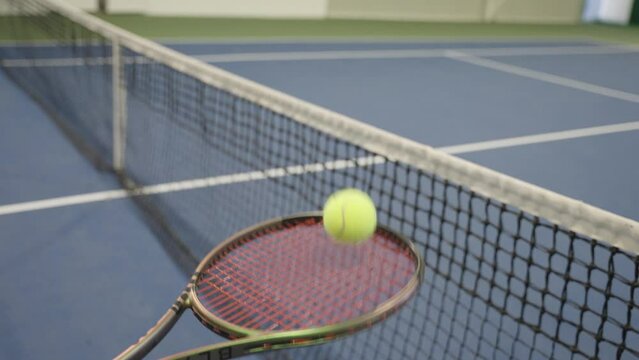 Tennis Ball Stops On The Racket