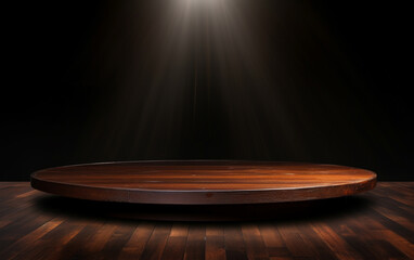 An empty wooden table for presentation with a dark background and isolated recessed lighting