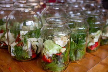 A simple and quick way to pickle tomatoes for the winter: interesting recipes for preparing canned tomatoes cucumber, blackcurrant leaves, cherries, a sprig of parsley and dill; wash thoroughly and dr