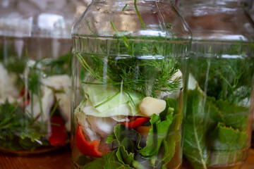 A simple and quick way to pickle tomatoes for the winter: interesting recipes for preparing canned tomatoes cucumber, blackcurrant leaves, cherries, a sprig of parsley and dill; wash thoroughly and dr