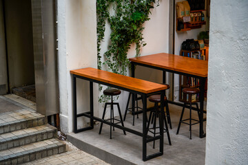 Casual dining table and chair seating in a bar in Central, Hong Kong