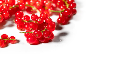 Red currant berries isolated on white background. Fresh and juicy organic redcurrant berry macro shot. Tasty vegan food border design. 