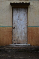 Textured wooden door with decay and grunge effect