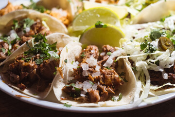 Party plate of authentic Mexican meat taco - carne asada, carnitas and barbacoa