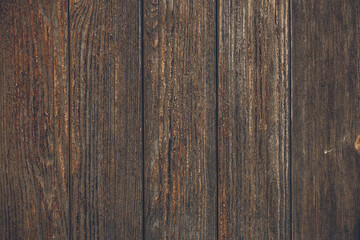 Dark wooden background, texture of brown woody board, grunge wallpaper. Old wood floor, rustic timber wall. Vintage slats, vertical pattern, natural plank surface. Weathered panel. Textured oaken door - obrazy, fototapety, plakaty