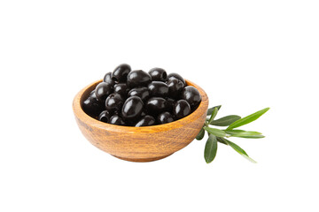 Tasty black olives in a wooden bowl with leaves isolated on a white background. Vegan. Design.