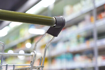 Grocery cart on the sales floor. Close-up