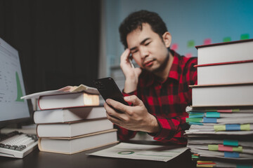 Startup company employees working in the office overtime are stressed and tired from overtime work,...