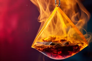 Foto op Plexiglas Intimate view of a tea bag's dance in hot water, as it releases a vibrant hue, symbolizing soothing moments © Davivd