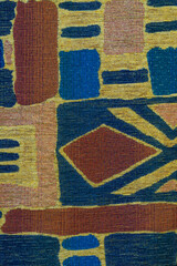 Detail of multicolored rough fabric for background or texture, closeup