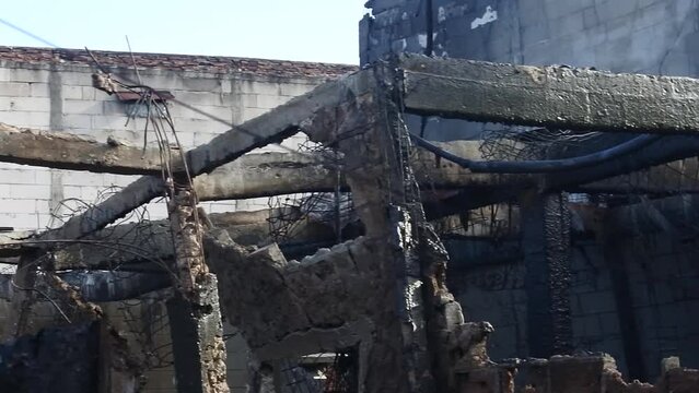Residents' houses were damaged by the explosion of a fuel storage tank near a densely populated settlement in Plumpang, North Jakarta, Indonesia