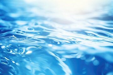 Macro view of blue water ripples with sun reflections