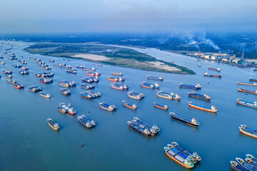 Hundreds of vessels are seen anchored in Karnafuli river near port in Chattogram. The Port of...