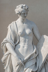 Potsdam, Germany -  Old statue of a sensual Renaissance era woman after bathing in the city park...