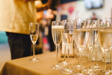 buffet. A glass of champagne. Alcohol.