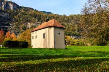 Fototapeta na wymiar Small church in Verolliey near Saint Maurice, Switzerland in autumn