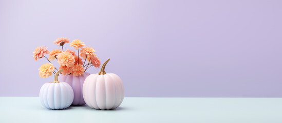 Minimal trendy thanksgiving halloween background, banner with pastel pumpkins with copy space. Autumn holidays decoration arrangement with pastel pumpkins and flowers