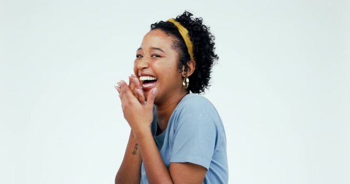 Surprise, joke and laughing woman face in studio with shy hands, humor or comic on white background. Omg, funny and portrait of female model embarrassed by gossip, rumor or drama with fake news emoji