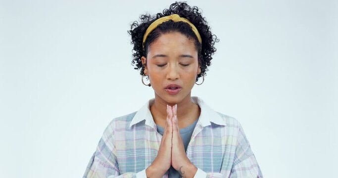 Praying, hands and woman in studio for worship, thank you and gratitude to God against white background. Pray, emoji and female model with prayer for hope, help or support, faith and trust in praise