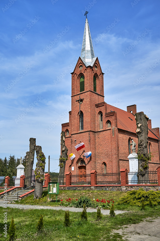 Poster The historic Gothic red brick church with belfry in the village of Sokola Dabrowa