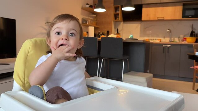 Adorable child in the highchair