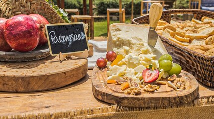 free cheese buffet on wooden boards and with decorations for an event