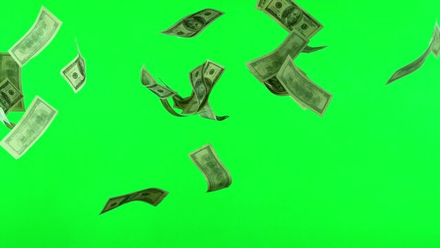 Super slow motion of flying US dollars banknotes on green background. Filmed on high speed cinema camera, 1000fps. Isolated on green screen, ready for background change.