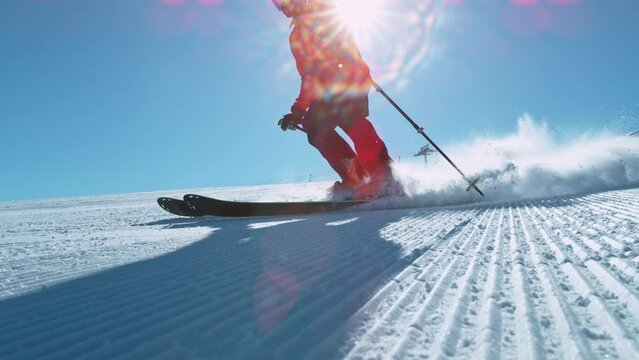 Freeride skier riding in the scenic mountains. Super slow motion at 1000 fps.
