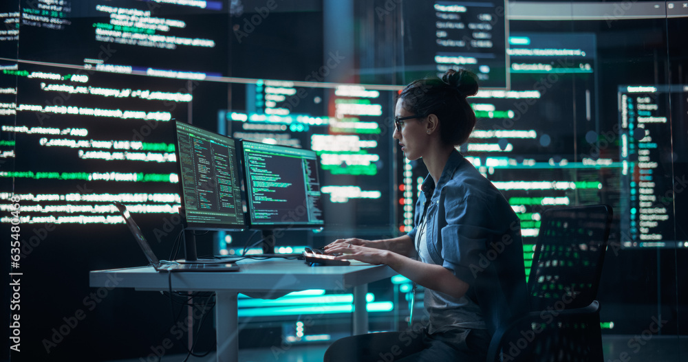 Poster Portrait of Woman Working on Computer, Typing Lines of Code that Appear on Big Screens Surrounding her in a Monitoring Room. Female Programmer Creating Innovative Software Using AI Data and System