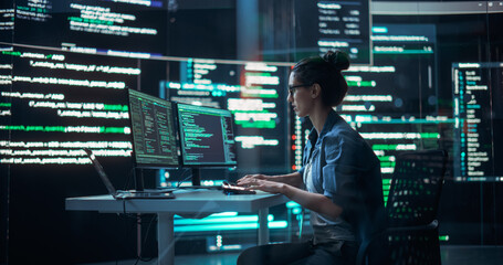 Portrait of Woman Working on Computer, Typing Lines of Code that Appear on Big Screens Surrounding her in a Monitoring Room. Female Programmer Creating Innovative Software Using AI Data and System