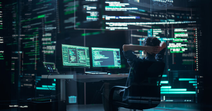 Female Developer Happily Resting After Successfully Typing on Computer a Functioning Back-end Code. Professional Programmer Surrounded by Big Screens Showing Coding Language, Creating Software
