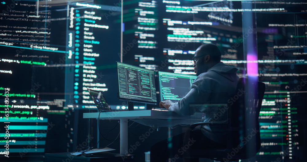 Leinwandbilder Black Male Developer Thinking and Typing on Computer, Surrounded by Big Screens Showing Coding Language. Professional Programmer Creating Software, Running Coding Tests. Abstract Programming Concept