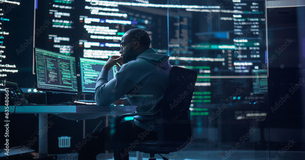 Aufkleber Portrait of a Black Man Working on Computer, Typing Lines of Code that Appear on Big Screens Surrounding him in Monitoring Room. Male Programmer Creating Innovative Software Using AI Data and System