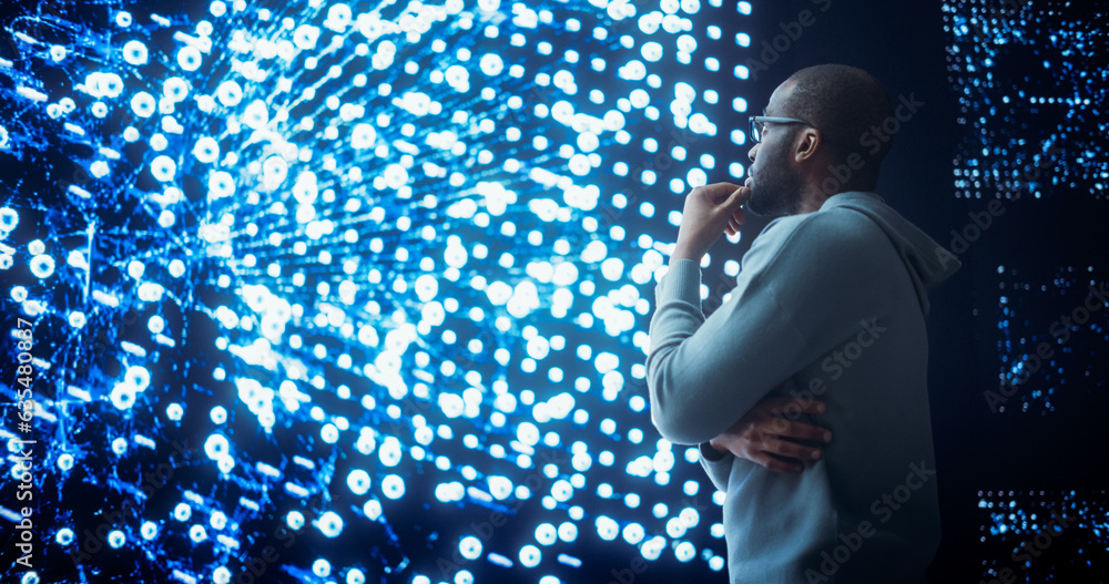 Poster Black Young Man Looking at a Big Screen with Neural Network Visualisation In 3D. Professional Computer Data Science Engineer Working in System Control and Monitoring Telecommunications Office