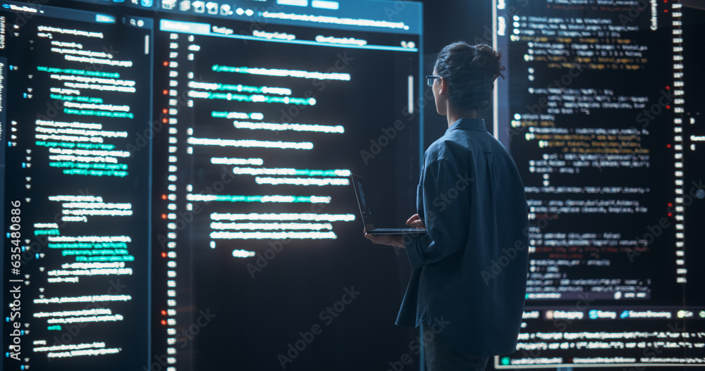 Aufkleber Shot of Female Programmer Working in a Monitoring Control Room, Surrounded by Big Screens Displaying Lines of Programming Language Code. Portrait of Woman Creating a Software, Coding