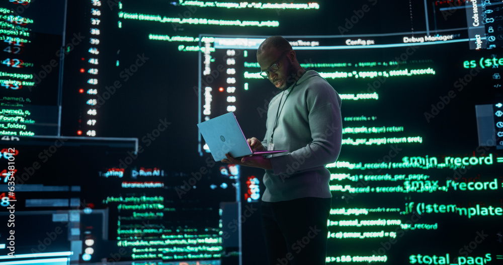 Poster Portrait of Young Black Man Working on Laptop Computer, Looking at Big Digital Screens Glitching While Displaying Code Lines. Professional Programmer Fixing a Bug, Dealing with Crashing System