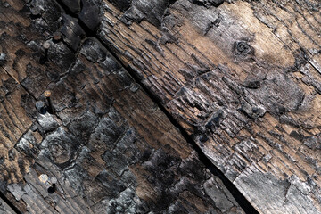Black grunge background. Burnt wood texture.