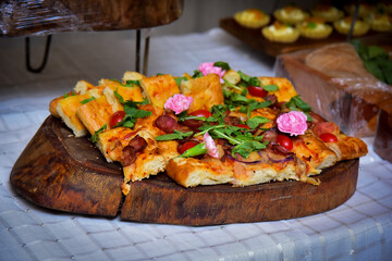 pepperoni pizza with arugula, tomato and edible flowers, pizza,  gastronomy background, food background	