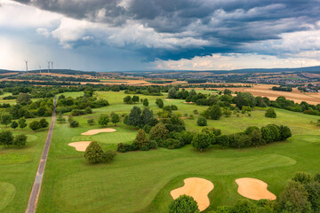 Huge storm clouds over a golf course in Taunus/Germany