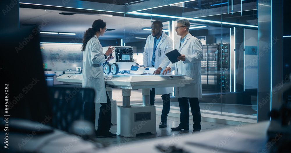 Poster Team of Industrial Engineers Working on a Mobility Robot at a Startup Factory. Multiethnic Male and Female Scientists Discussing an Automated AI Robotic Delivery Machine in a Laboratory