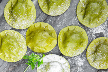 green ravioli green dough  spinach, basil vegetable food meal food snack on the table copy space...