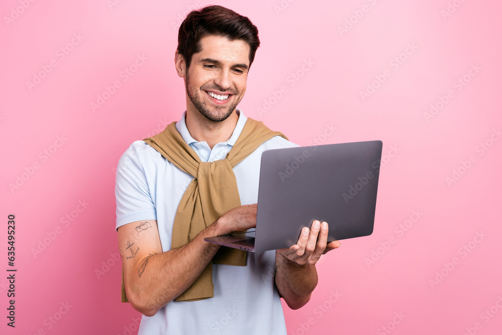Poster photo of cheerful nice person beaming smile use wireless netbook networking isolated on pink color b