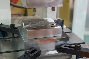 Closeup scene of the single stamping die operation.