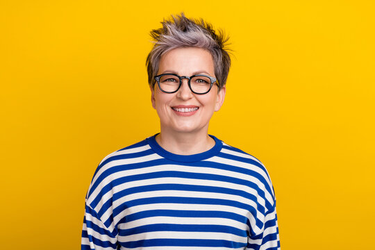 Portrait Of Confident Senior Lady Grey Short Hairstyle Cheerful Person Friendly Smiling Business Owner Isolated On Yellow Color Background