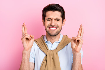 Portrait of young guy hipster expensive clothes crossed fingers bite lips pray nervous god bless...