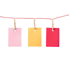 Three paper tags in multiple colors against a transparent background