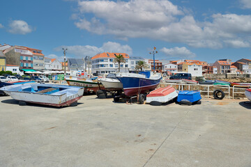 small ships and fishing boats in dry dock in the port